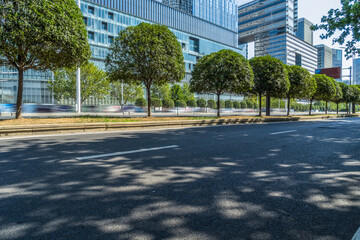 empty asphalt road with city skyline background in china