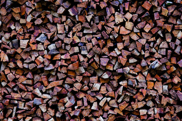 wall firewood, Background of dry chopped firewood logs in a pile.Arranged beautifully 