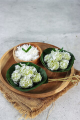 Klepon cake or ondeh ondeh is made of glutinous rice flour which is shaped like small balls and filled with brown sugar and then  rolled over grated coconut.