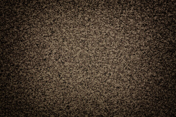 Grainy brown background of tabletop with dark vignette. Texture abstract surface