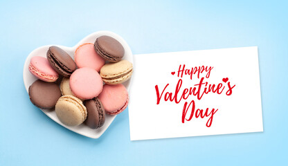 Valentines day with macaroons in heart shaped plate