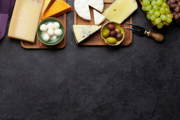 Various cheese, grapes and olives
