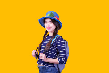 Asian woman tourist was running her to various places.happy excited emotional young woman photographer tourist standing isolated over Orange background