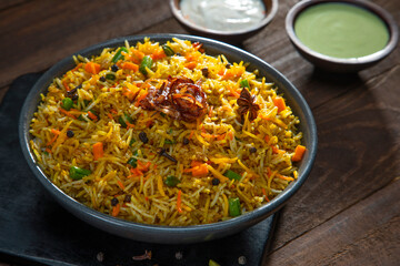 Pulao an Indian speciality, a dish made of rice with mint chutney	