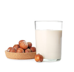 Glass of hazelnut milk isolated on white background