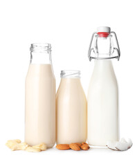 Bottles of different milk isolated on white background