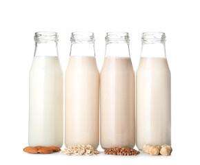 Bottles of different milk isolated on white background