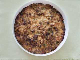 Casserole topped with cheese, overhead