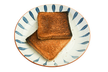 The bread is burnt and cannot be eaten.