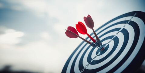 Close up shot of the dart arrow hit on bulleyes of dartboard to represent that the business reached...