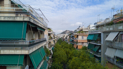 Fototapeta na wymiar houses in the city, street of Athens, Greece