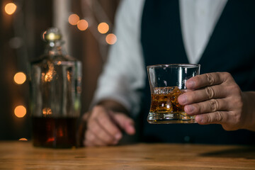 Barman pouring whiskey whiskey glass beautiful night