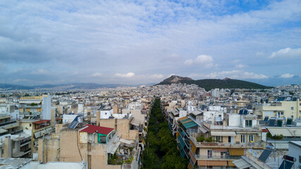 Fototapeta na wymiar houses in the city, street of Athens, Greece, drone view