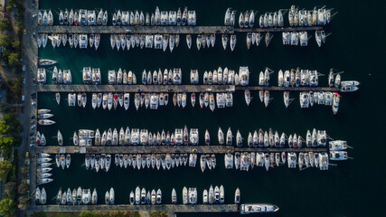 Aerial drone bird's eye view of marina in Athens with docked yachts, Piraeus Harbour port of Athens