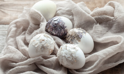 Original decorated Easter eggs close up on sacking cloth.