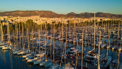Fototapeta premium Aerial drone bird's eye view of marina in Athens with docked yachts, Piraeus Harbour port of Athens