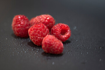 Raspberries on a sprayed surface 3