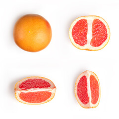 Set of fresh orange cut grapefruit whole, half and slices isolated on white background.