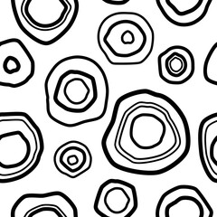 Seamless pattern with black shabby circles on white background. Kaleidoscope wallpaper