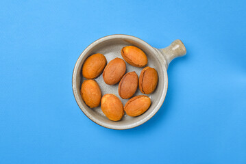 Pastry cookies nuts, cookies with condensed milk inside. Traditional Georgian dessert for tea or coffee.