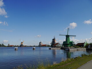 Fototapeta na wymiar Photos of popular attractions in Zaandem, Netherlands, natural atmosphere. Beautiful windmill on 23 September 2017
