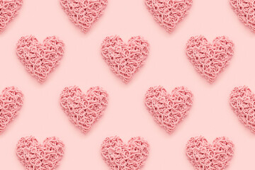Fototapeta na wymiar Hearts pattern for Valentines Day on pink background. Abstract, flat lay.