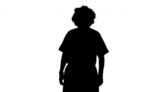 Silhouette Funny clown looking at watch and running away being late.