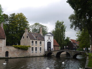 Fototapeta na wymiar Scenery of buildings and attractions Beautiful nature in Bruges, City in Belgium September 25, 2017.