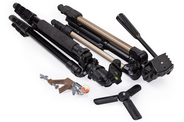 Various tripods and old camera mount bracket, close-up