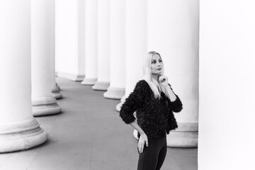 Modern girl in black outfits, casual style. Young lady at spring day, modern fashionable details