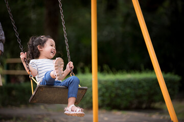 Little children having fun in the playground