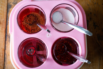 close up of a sugar,Garnish for noodle Thai style. Chili, Sugar and Vinegar ingredient for Thai style noodle.