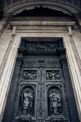 Antique (19th century) metal doors outside on the facade of the historic St. Isaac's Cathedral in St. Petersburg