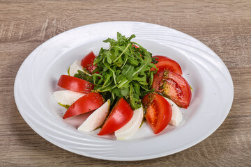 Traditional Italian Caprese salad with mozarela