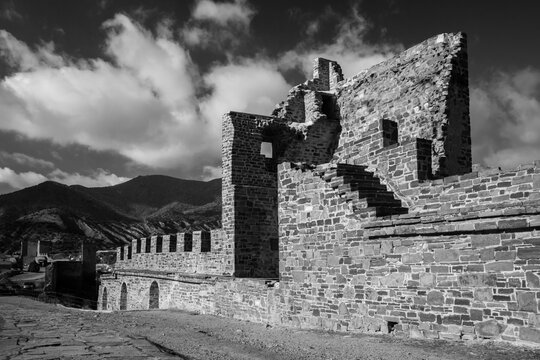 The walls of the Genoese fortress in Sudak, Crimea. The tower of Luchini di Fieschi di Lavani in the Genoese fortress in Sudak, Crimea