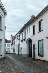 Fototapeta na wymiar Streets in the historic city of Thorn in Limburg, the Netherlands. Known for its white houses.