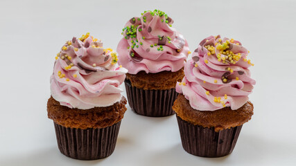 Cupcakes with cream and beautiful decoration
