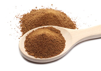 Coconut sugar pile with wooden spoon isolated on white background