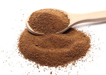 Coconut sugar pile with wooden spoon isolated on white background