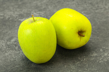 Two ripe green sweet apples