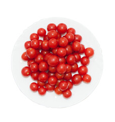 Cherry tomatoes in a plate on a white background