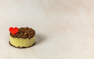 Lemon chocolate cheesecake with decorative heart, homemade sweet treat for Valentine's day, copy space