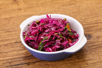 Obraz na płótnie Canvas Pickled red cabbage with herbs