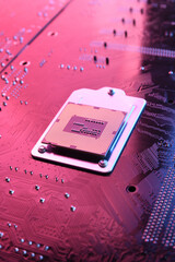 Computer cpu processor chip on circuit board ,motherboard background. Close-up. With red-blue...
