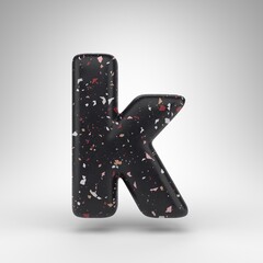 Letter K lowercase on white background. 3D letter with black terrazzo pattern texture.