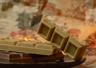 Vegetarian chocolate on a plate.Handmade white and milk chocolate.