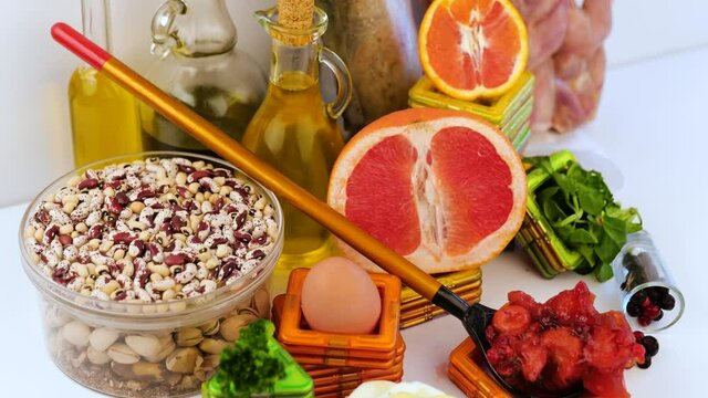 Composition with food contains coenzyme Q10, antioxidant, produce energy to cell, products against free radicals, and supports body as it ages, immune system, keeping body strong and healthy.