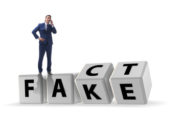 Face or fact concept with turning cubes
