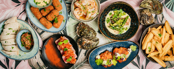 Small Tapas Restaurant Dishes On A Jungle Background 