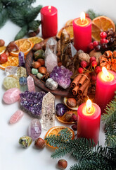 Different Crystals gemstones, natural decor, candles. Witchcraft Ritual, energy healing minerals. Esoteric, relax, life balance, modern magic concept. Christmas, Magical Winter Solstice